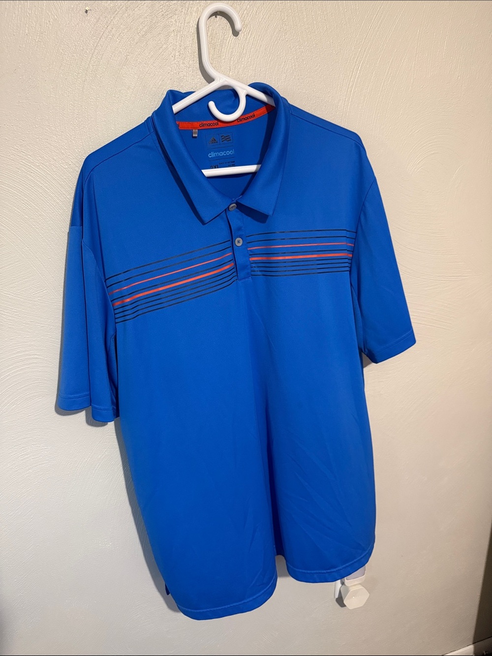 adidas Men’s Blue Polo with orange Accent Stripes
